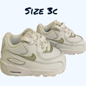 Gently Used Nike baby size 3c sneakers ( off white & gold )